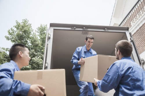 Furniture and boxes being prepared for collection and delivery