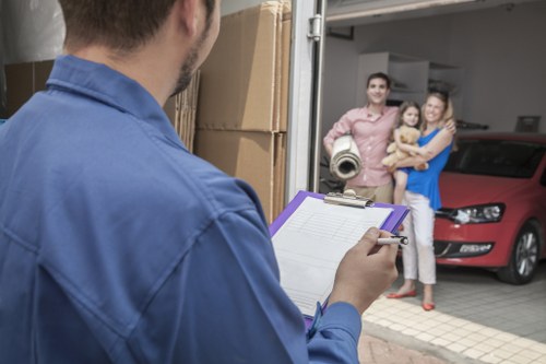 Furniture and household items being carefully loaded for a Removalvan move