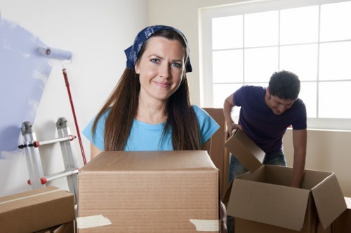 Careful loading of household items into a moving van