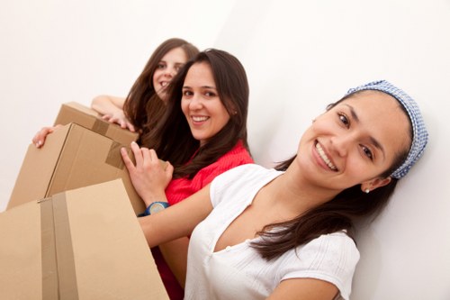 Office furniture and files being moved for a business relocation