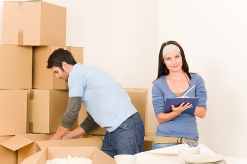 Man with van service assisting with a flat move and stair access