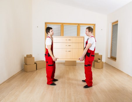 Local removal team handling boxes and household items